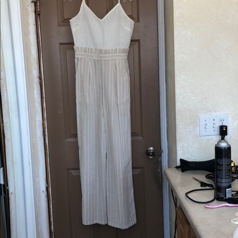 Super cute cream and white jumpsuit size small